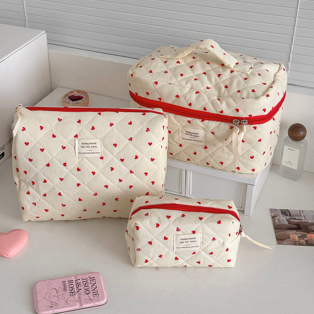 ensemble de trois trousse de toilette