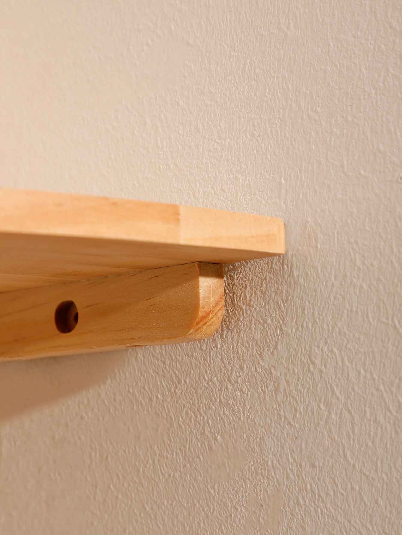 etagere bois montre la fixation