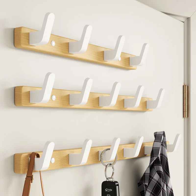 trois porte manteau bois